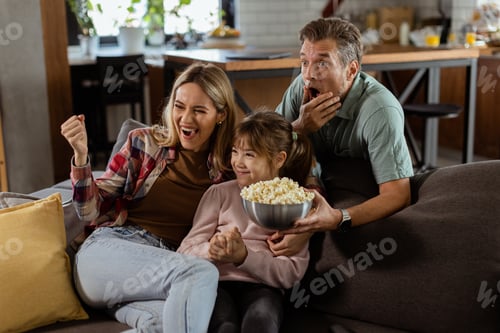 Preview: Family Movie Night: Engrossed in Thrilling Scenes at Home