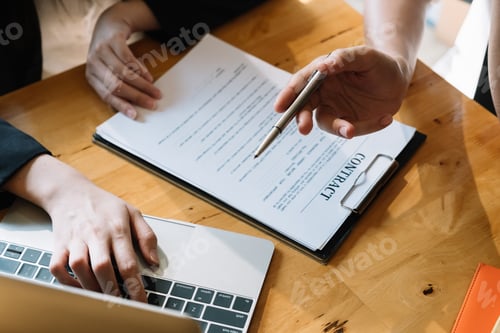Preview: Business people signing a contract for business