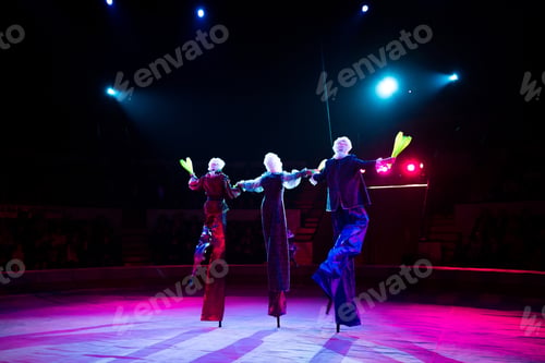 Preview: Jugglers in the circus. Clown on stilts