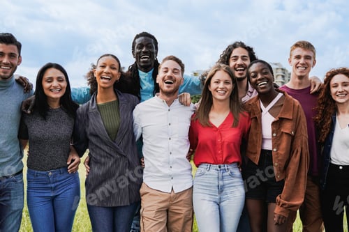 Preview: Diverse group of friends having fun looking at camera in summer day. Young people celebrate outside