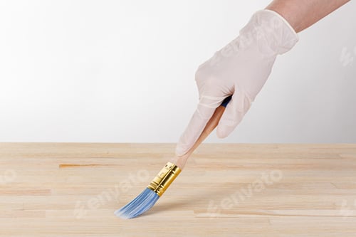 Preview: painting wooden background, hand with brush and can of paint