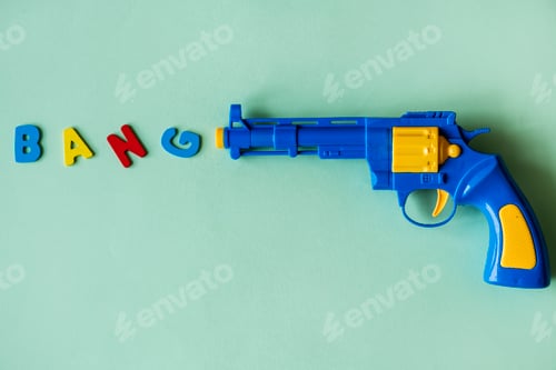 Preview: Bright and colorful plastic toy gun