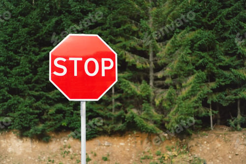 Preview: Traffic sign. STOP sign on pole near the road