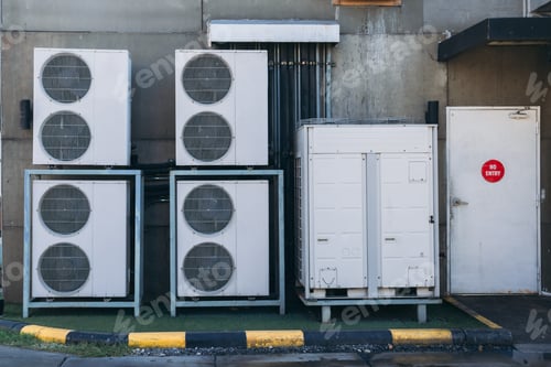 Preview: Air conditioner compressor installed on the wall.