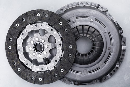 Preview: Close-up picture of a part of car, black clutch disk isolated on white background