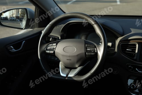 Preview: Black steering wheel inside of modern car