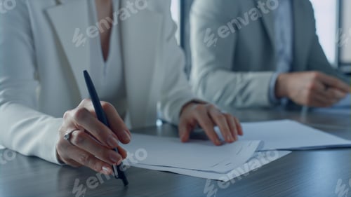 Preview: Closeup hands checking papers on corporate meeting. Business partners exchanging