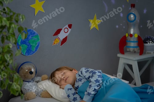 Preview: Happy child sleeping at home