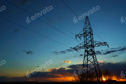 Preview: Power lines against the sky at sunset