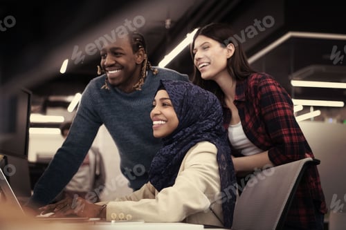 Preview: multiethnics team of software developers working together