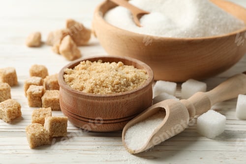 Preview: Bowls with sugar on white wooden background, close up
