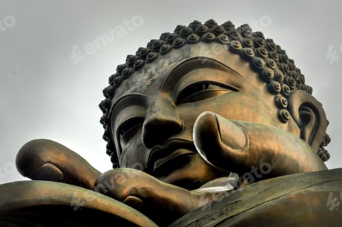 Preview: Low angle shot of a giant statue under the sunlight in Po Lin Monastery, Hong Kong, China