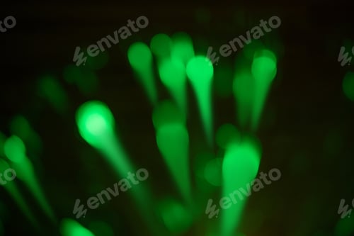 Preview: Blurred green light splash, bokeh effect background.