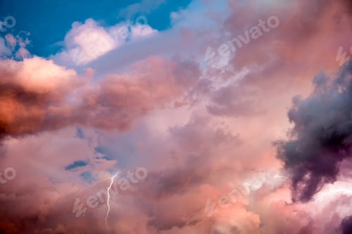 Preview: Beautiful dramatic sky with colorful clouds and thunderbolt at sunset