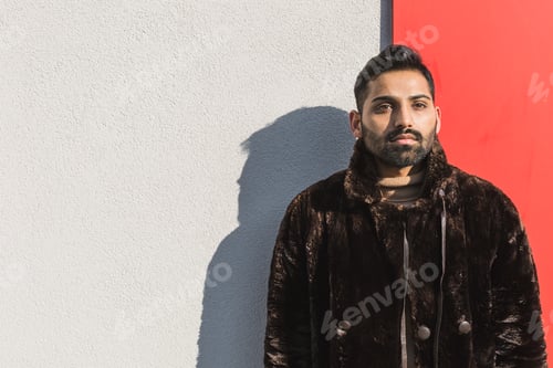 Preview: Young Indian man posing in an urban context