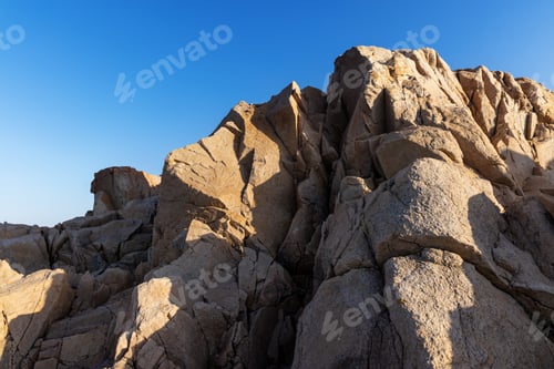 Preview: Rocks on the beach near the Black Sea against the background of the sky with clouds