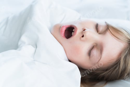 Preview: Little snoring girl, sleeping on pillow in bed with closed eyes. Evening late going to bed. Bedtime