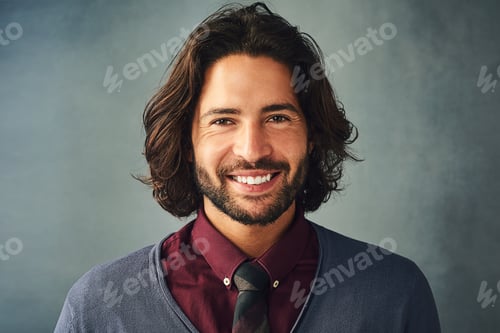 Preview: Hes a charmer. Studio portrait of a stylishly dressed handsome young man smiling.