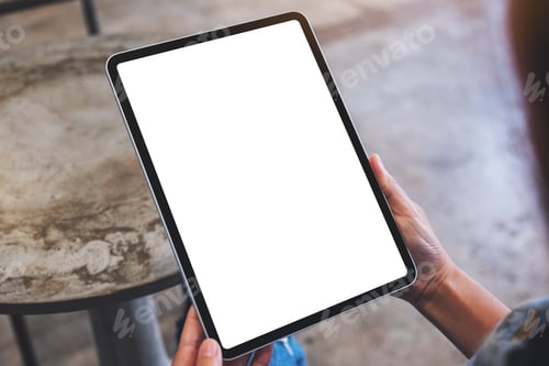 Preview: Mockup image of a woman holding digital tablet with blank white desktop screen