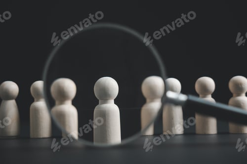 Preview: Magnifying glass focuses on a single white figurine in a row of others, representing selection or