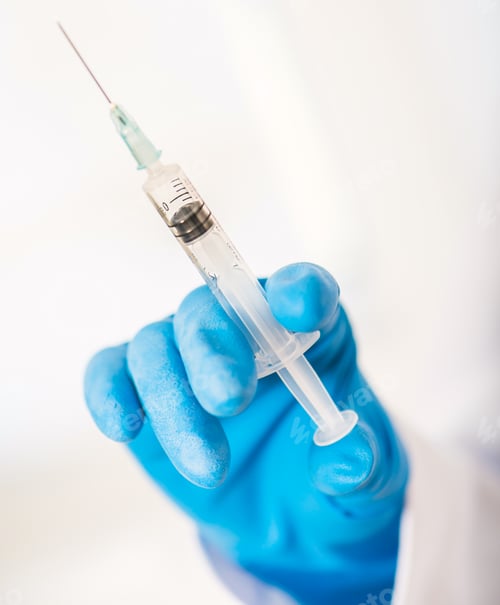 Preview: Doctor with syringe