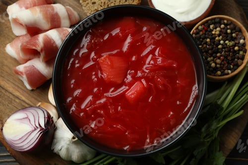 Preview: Concept of tasty food with borscht and ingredients on wooden background