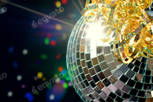 Preview: Shiny retro disco ball sparkling in light with festive glittery ribbon & sparkly colorful confetti
