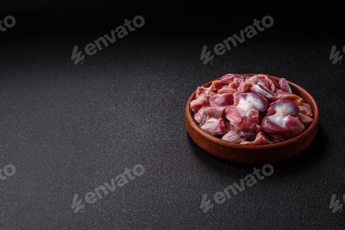 Preview: Raw chicken or turkey gizzards with salt, spices and herbs