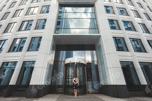 Preview: Love Story. The guy hugs the girl. Glass building.