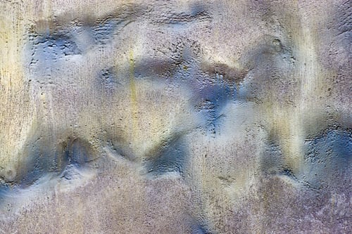 Preview: The Abstract Textured Background Of A Bumpy Surface Of Iridescent Color