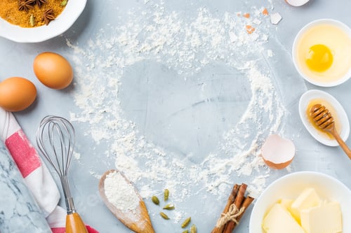 Preview: Baking cooking ingredients on a kitchen table