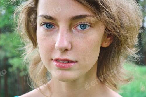 Preview: Young Woman Portrait in Natural Outdoor Setting