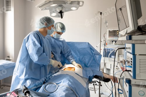 Preview: Two surgeons operating a patient with endoscopes