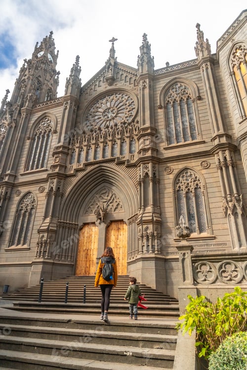 Preview: A mother with her son visiting the Church of San Juan Bautista, Arucas Cathedral, Gran Canaria