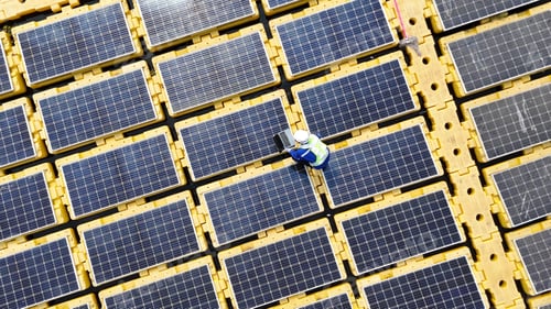 Preview: Floating solar panels providing renewable energy. Aerial view floating on solar cells