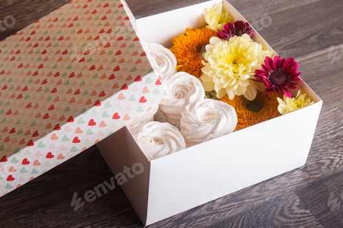 Preview: box with white zephyr and sunflowers and chrysanthemums