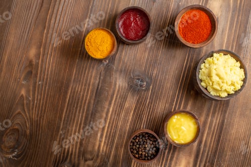 Preview: top view different seasonings with mushed potatoes on brown wooden desk spicy pepper ripe potato