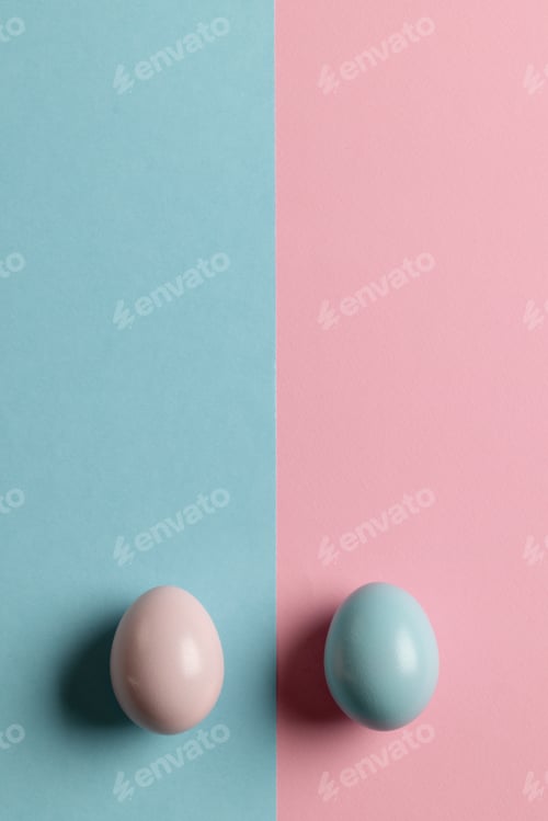 Preview: Image of pink and blue easter eggs and copy space on pink and blue background
