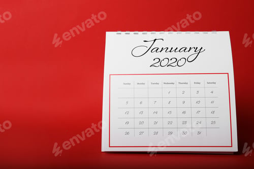 Preview: Paper calendar on red background. Planning concept