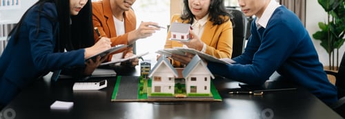 Preview: balancing the property sector The real estate agent is explaining the house design