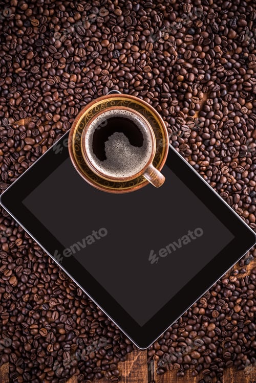 Preview: Digital tablet and coffee cup