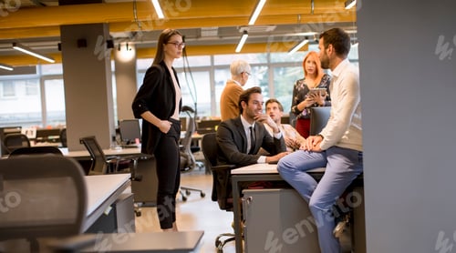 Preview: Senior businesswoman and young business people work in a modern office