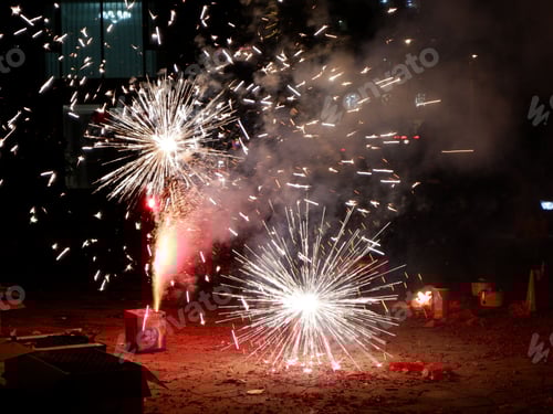 Preview: large fireworks being fired in the air over a dirt ground
