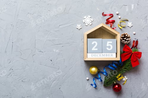 Preview: Christmas calendar 25 december. Christmas gift, fir branches, pine cones. Flat lay,