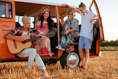 Preview: Hippie friends with guitar on a road trip