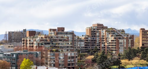 Preview: Aerial View of Residential Homes and Modern Cityscape