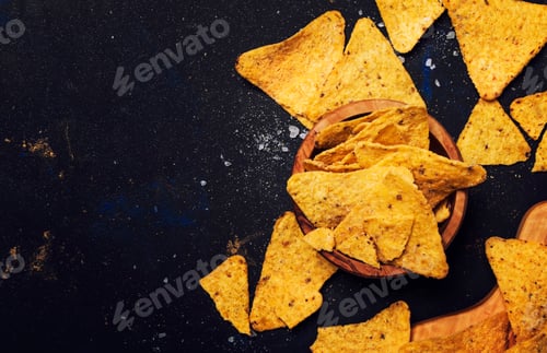 Preview: Nachos iIn Wooden Bowl, Black Background, Top View