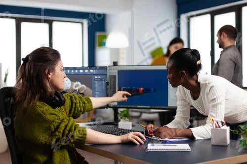 Preview: Diverse women game developers creating game interface