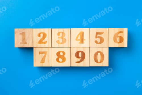 Preview: Numbers. Wooden colorful alphabet blocks on blue background, flat lay, top view