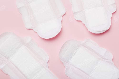 Preview: Women hygiene products or sanitary pad on colored background. Pastel color
